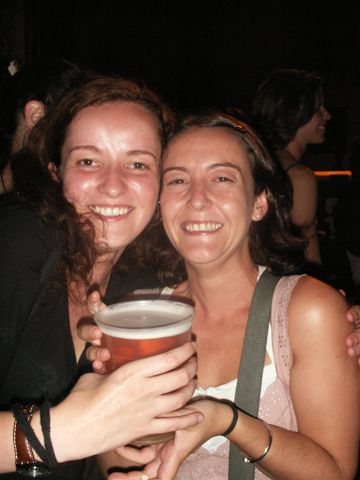 Meri and her cousin with a huge glass of beer!